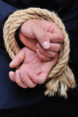 rope binding mans hands