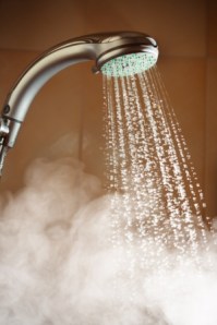 shower with flowing water and steam