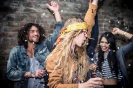 Group of young adults hanging around in a disco club
